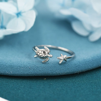 Polynesian Pride Turtle and Starfish Ring – Adjustable Sterling Silver Ocean Jewelry