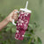 Plumeria Floral Tapa Pattern Ruby Pink Tumbler With Handle