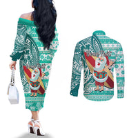 Custom Hawaii Mele Kalikimaka Couples Matching Off The Shoulder Long Sleeve Dress and Long Sleeve Button Shirt Santa Claus Surfing with Hawaiian Pattern Striped Turquoise Style LT03 - Polynesian Pride