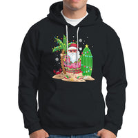 Christmas In Hawaii Hoodie Flamingo Float Xmas Palm Tree Surfboard Cute Santa At Beach TS09 Black - Polynesian Pride